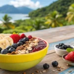 A colorful acai bowl with fresh fruit toppings on a wooden table